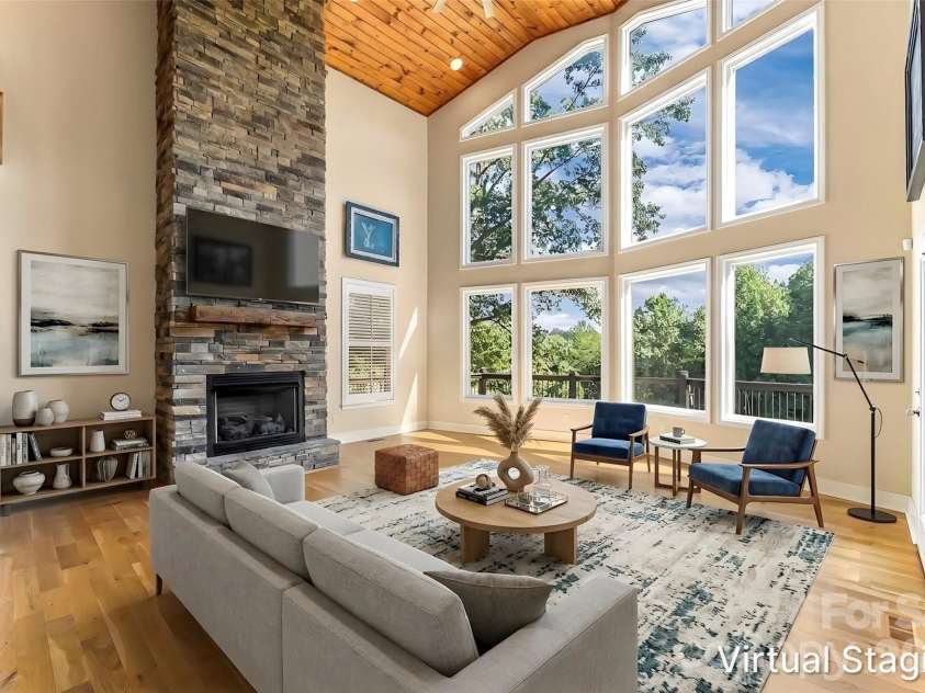 94 Fairway Drive, Nebo, NC 28761.  MLS# CAR4404522, YatesRealty ID 38125. Great room-virtually staged