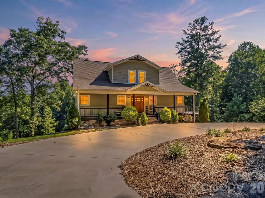 94 Fairway Drive, Nebo, NC 28761.  MLS# CAR4404522, YatesRealty ID 38125. Twilight photo-artificially created