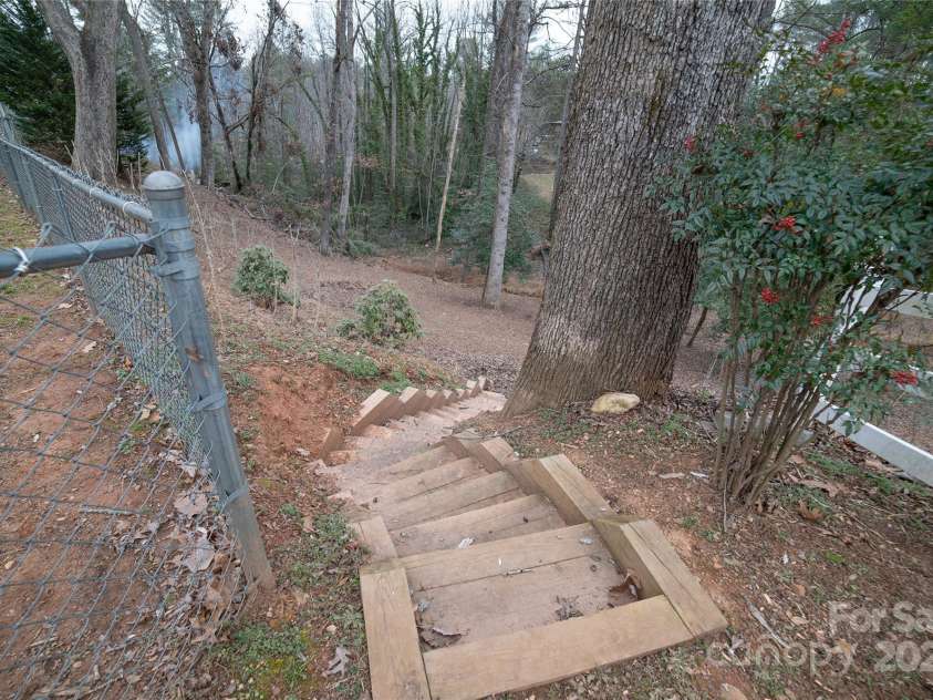 3154 Frank Whisnant Road, Morganton, NC 28655.  MLS# CAR4227309, YatesRealty ID 3813. Stairs to Lower Lawn