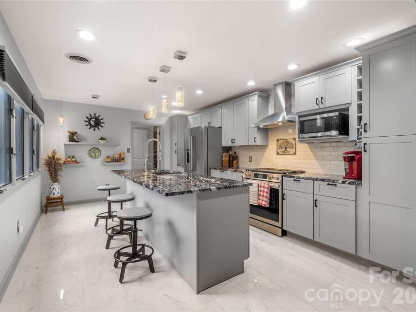 106 Deerlake Drive, Asheville, NC 28803.  MLS# CAR4403327, YatesRealty ID 38136. Updated Kitchen and Appliances
