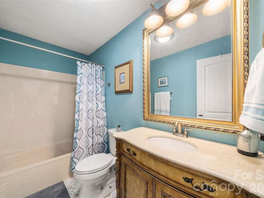 106 Deerlake Drive, Asheville, NC 28803.  MLS# CAR4403327, YatesRealty ID 38136. Updated Second Bathroom upstairs