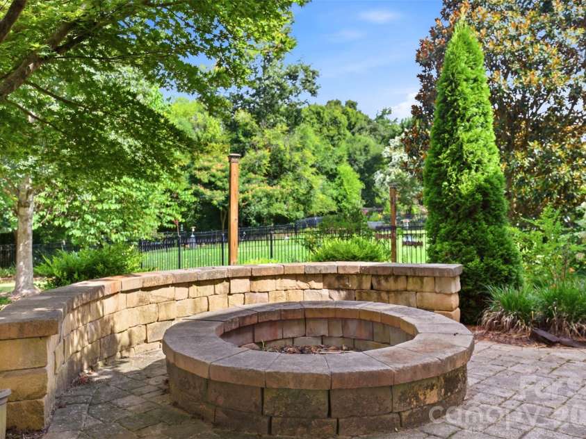 1507 Belmont Stakes Avenue, Indian Trail, NC 28079.  MLS# CAR4405383, YatesRealty ID 38137. Firepit for those cozy evenings outdoors
