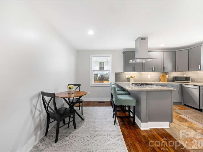 1120 Meadow Lane, Charlotte, NC 28205.  MLS# CAR4397732, YatesRealty ID 38138. Eat-in Kitchen with room for 3 barstools.