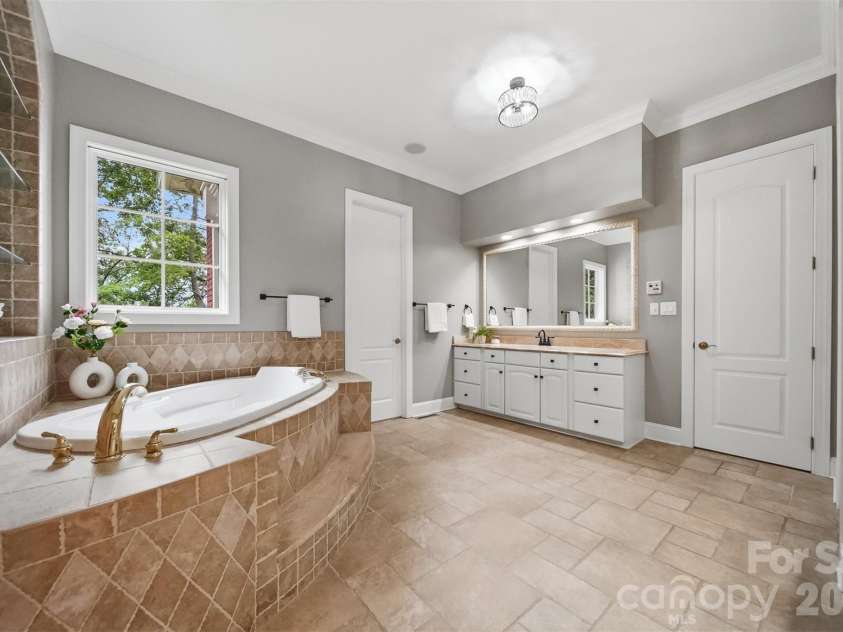 3745 Pinecrest Drive, Hickory, NC 28601.  MLS# CAR4403164, YatesRealty ID 38139. Another view of the master bath on main level.
