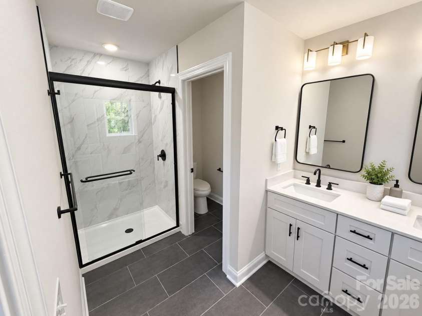 548 Carolyn Lane, Charlotte, NC 28213.  MLS# CAR4405325, YatesRealty ID 38148. Luxury Primary Bath