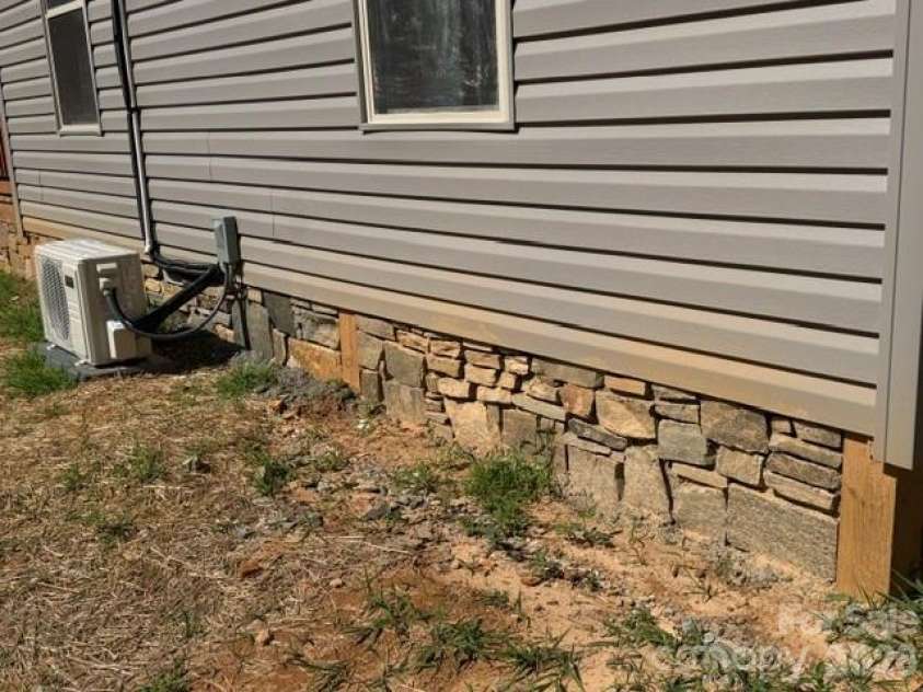 291 McGinnis Way, Old Fort, NC 28762.  MLS# CAR4405208, YatesRealty ID 38149. Rock Work
