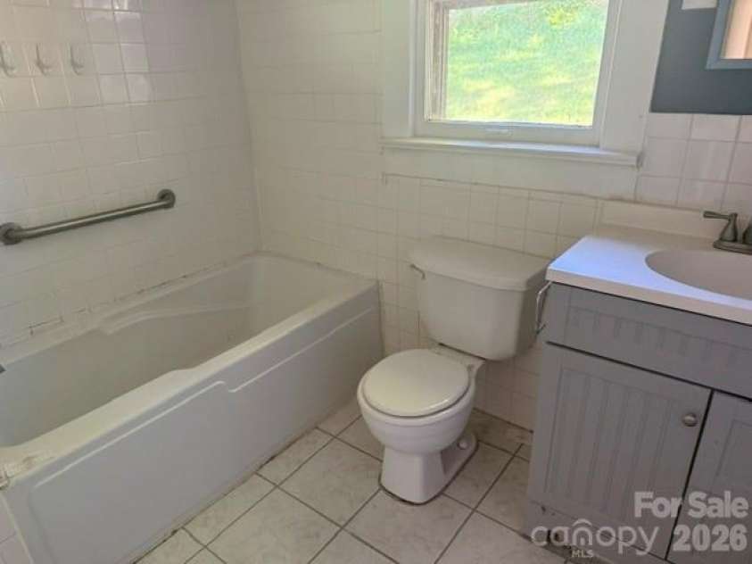 307 Yancey Street, Marion, NC 28752.  MLS# CAR4405596, YatesRealty ID 38158. 