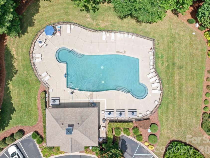 157 Eclipse Way, Mooresville, NC 28117.  MLS# CAR4405597, YatesRealty ID 38166. Plenty of space on pool decking for a fun pool day.