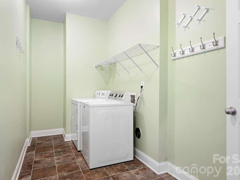 157 Eclipse Way, Mooresville, NC 28117.  MLS# CAR4405597, YatesRealty ID 38166. The main level laundry has space for a drop zone.