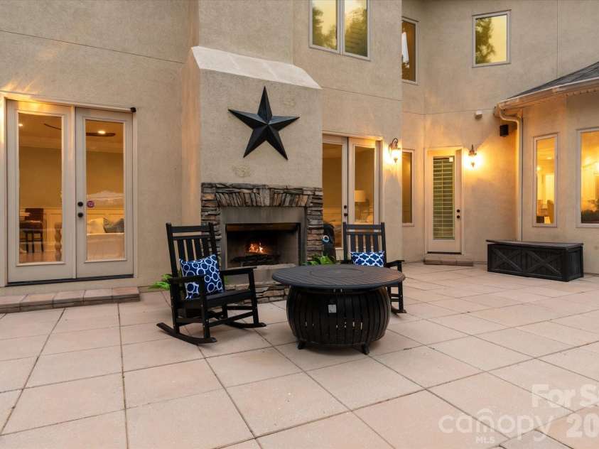 102 Finch Loop, Fort Mill, SC 29715.  MLS# CAR4394123, YatesRealty ID 38168. Outdoor Fireplace area