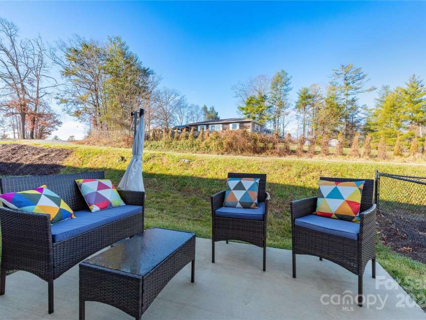 39 Benedict Lane, Weaverville, NC 28787.  MLS# CAR4208011, YatesRealty ID 3817. Back Patio/Yard