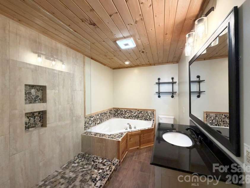 3430 Tranquil Hills Drive, Lenoir, NC 28645.  MLS# CAR4402608, YatesRealty ID 38174. Primary Bathroom