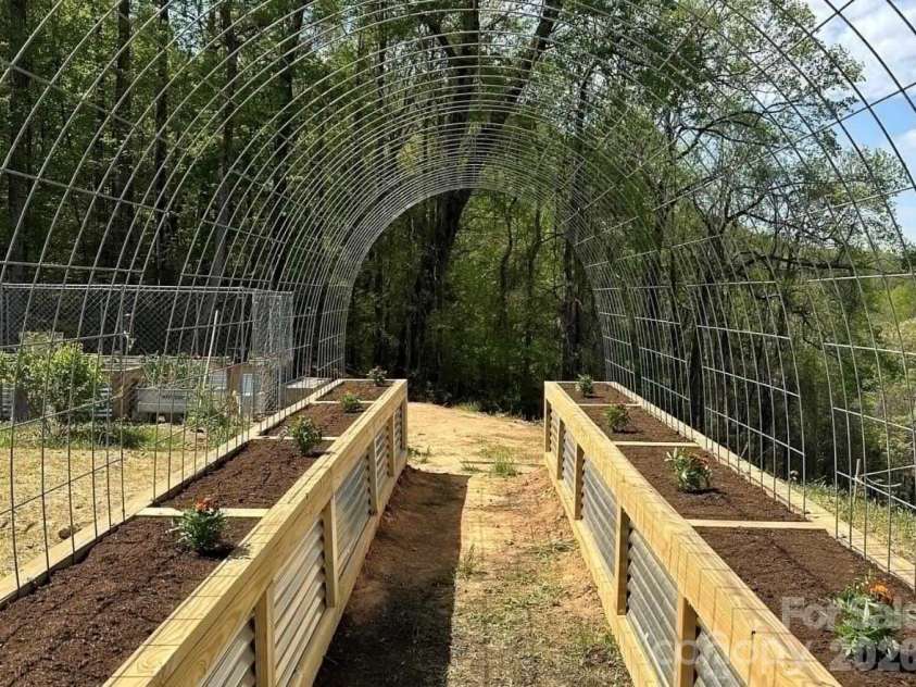 3430 Tranquil Hills Drive, Lenoir, NC 28645.  MLS# CAR4402608, YatesRealty ID 38174. Tomato/Bean Hoop w/Compost Soil