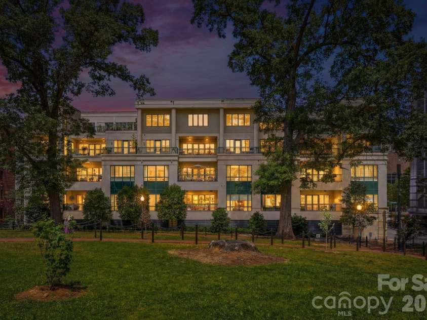 229 Church Street, Charlotte, NC 28202.  MLS# CAR4381312, YatesRealty ID 3818. Boutique luxury living surrounded by the charm and greenery of historic Fourth Ward with beautiful evening ambiance throughout the community.
