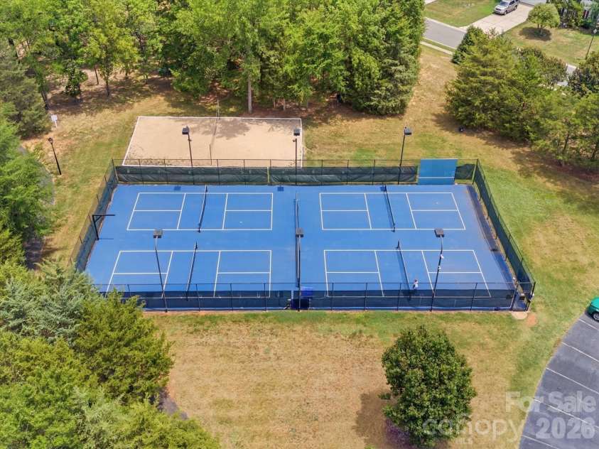 2007 Rosewater Lane, Indian Trail, NC 28079.  MLS# CAR4403255, YatesRealty ID 38180. Pickle ball and Beach Volleyball courts