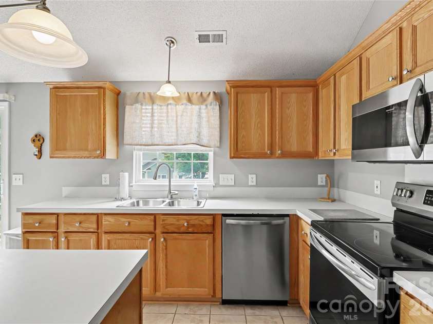 5895 Birchfield Lane, Concord, NC 28027.  MLS# CAR4404235, YatesRealty ID 38184. 