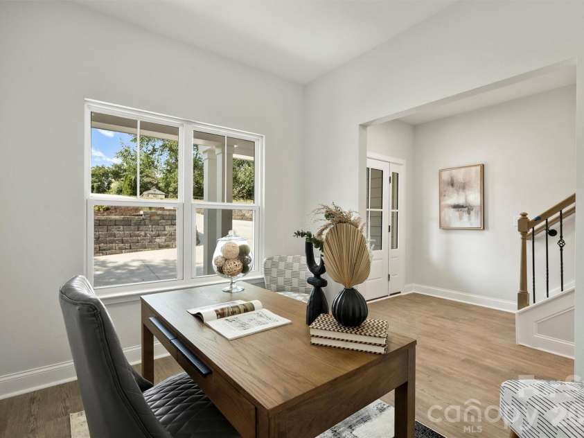 126 Meadow Glen Drive, Troutman, NC 28166.  MLS# CAR4340501, YatesRealty ID 3819. Flexible front room offering versatility as a home office, dining area, or additional living space.