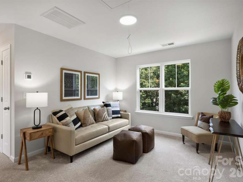 126 Meadow Glen Drive, Troutman, NC 28166.  MLS# CAR4340501, YatesRealty ID 3819. Second level area at the top of the stairs, ideal for flex space or open office.