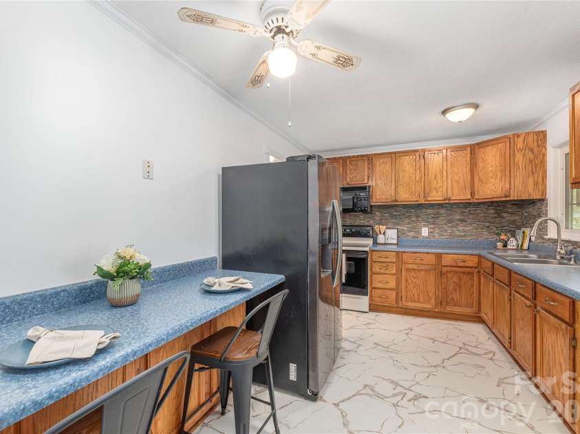881 Mulberry Street, Clyde, NC 28721.  MLS# CAR4398802, YatesRealty ID 38191. 