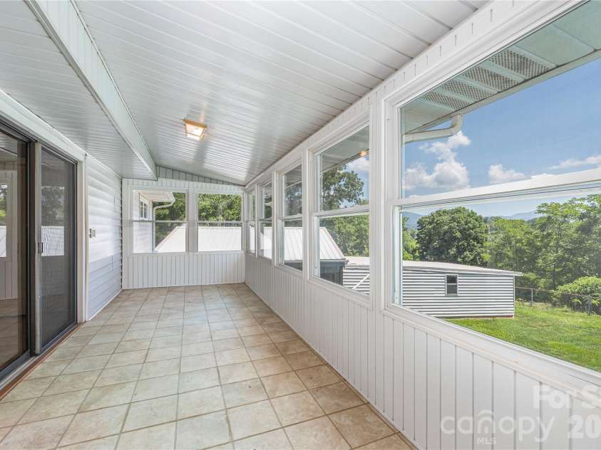 881 Mulberry Street, Clyde, NC 28721.  MLS# CAR4398802, YatesRealty ID 38191. 