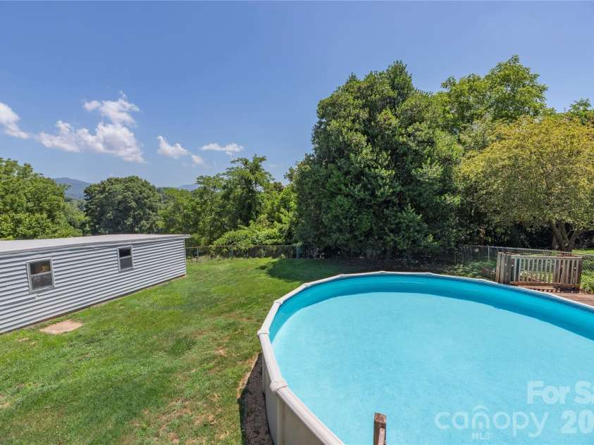 881 Mulberry Street, Clyde, NC 28721.  MLS# CAR4398802, YatesRealty ID 38191. 