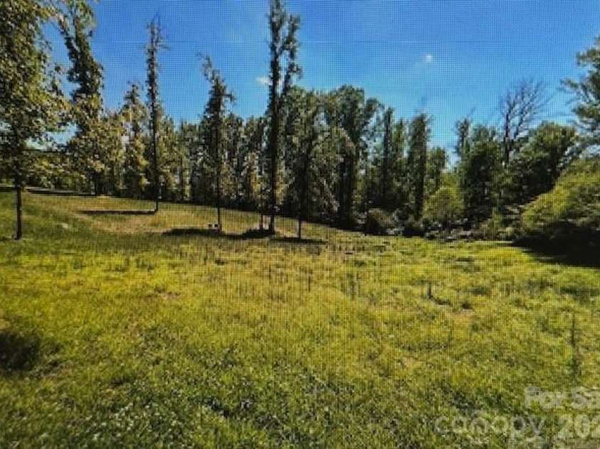 1639 Mallard Bay Drive, York, SC 29745.  MLS# CAR4313912, YatesRealty ID 3820. Private, wooded surroundings - sloping back to a natural creek