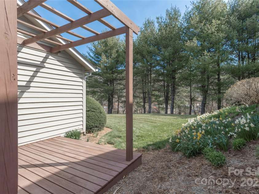 30 Cedarcliff Circle, Asheville, NC 28803.  MLS# CAR4235579, YatesRealty ID 3820. Back deck off of kitchen great for grilling and eating al fresco.