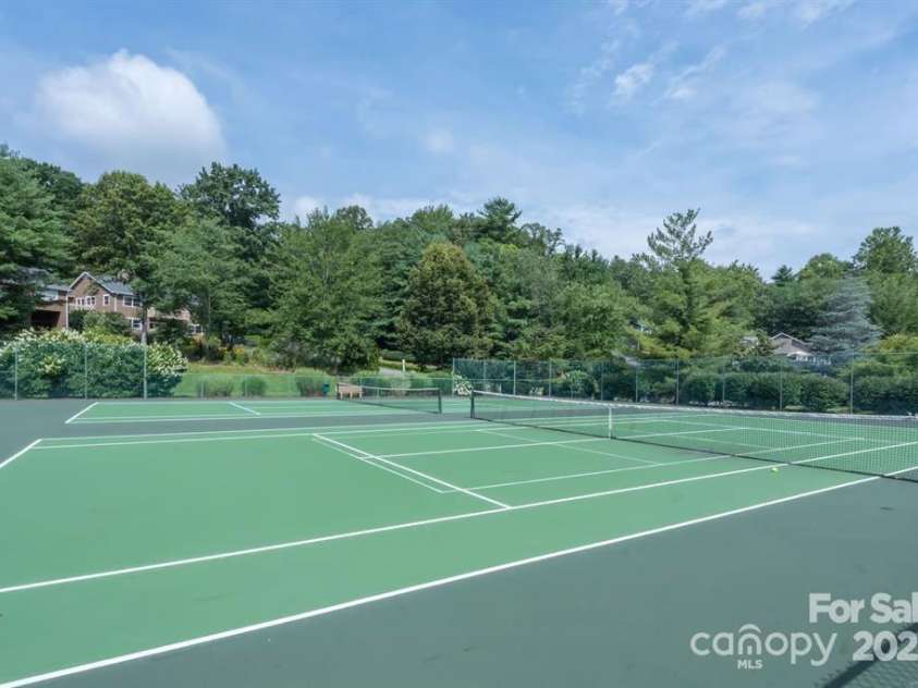 30 Cedarcliff Circle, Asheville, NC 28803.  MLS# CAR4235579, YatesRealty ID 3820. Community tennis and pickleball courts.