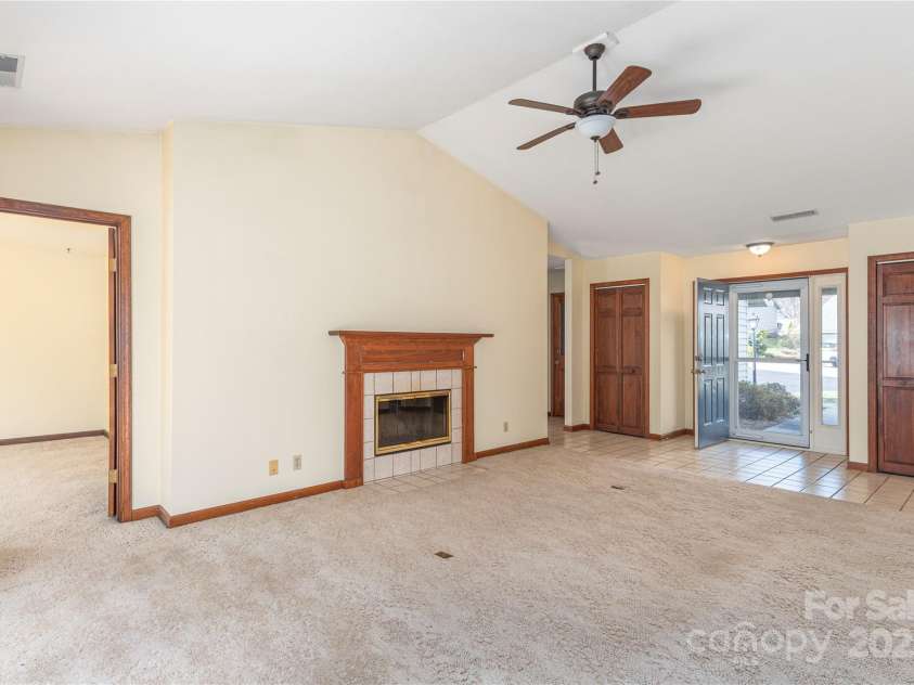 30 Cedarcliff Circle, Asheville, NC 28803.  MLS# CAR4235579, YatesRealty ID 3820. Vaulted living room area looking into bedroom #3.