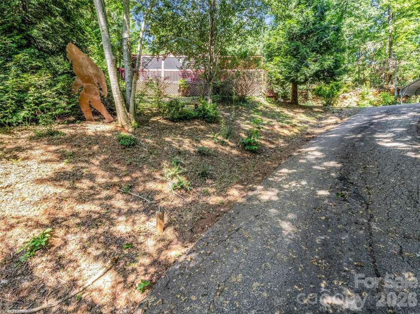 771 Bishop Lane, Mill Spring, NC 28756.  MLS# CAR4402448, YatesRealty ID 38213. 