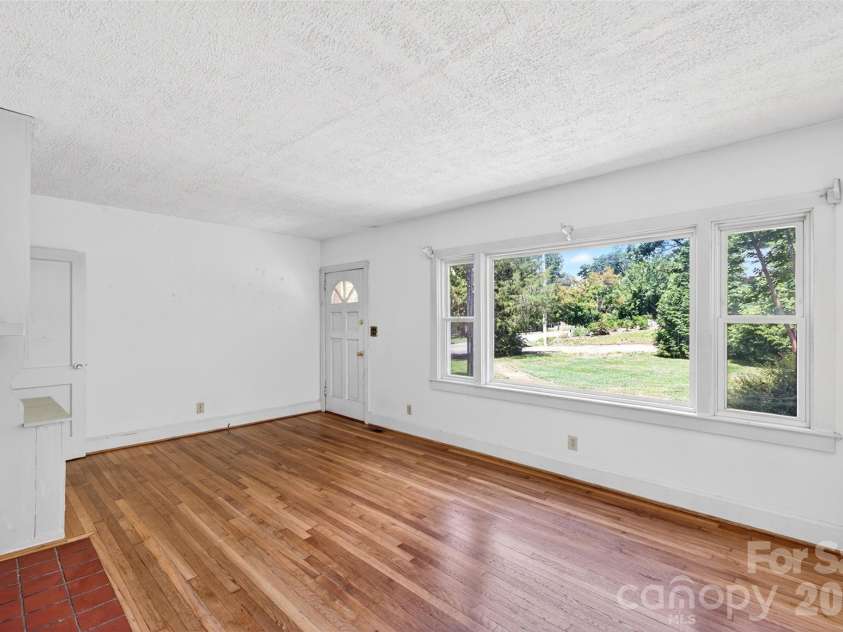 64 Second Street, Tryon, NC 28782.  MLS# CAR4395265, YatesRealty ID 38214. 
