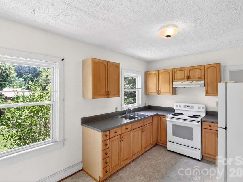64 Second Street, Tryon, NC 28782.  MLS# CAR4395265, YatesRealty ID 38214. 