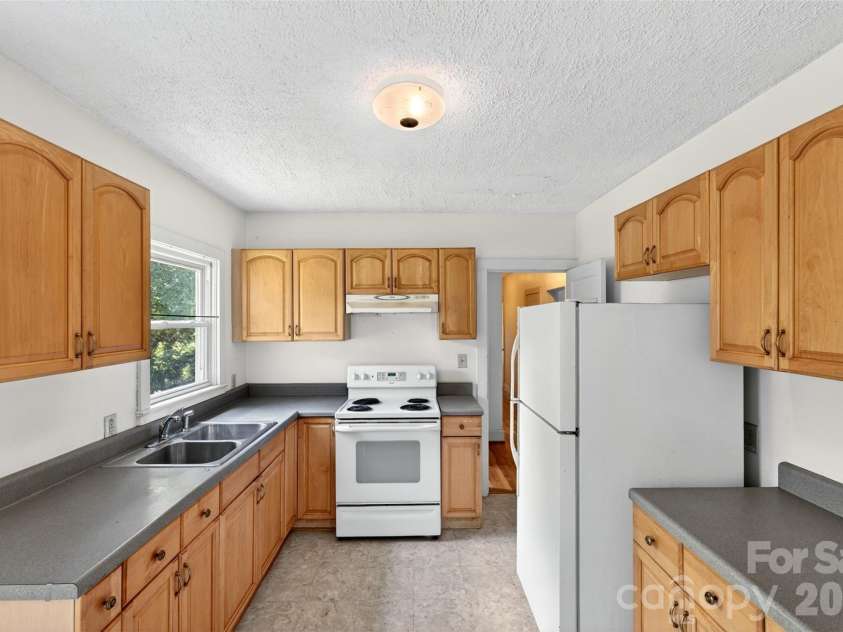 64 Second Street, Tryon, NC 28782.  MLS# CAR4395265, YatesRealty ID 38214. 