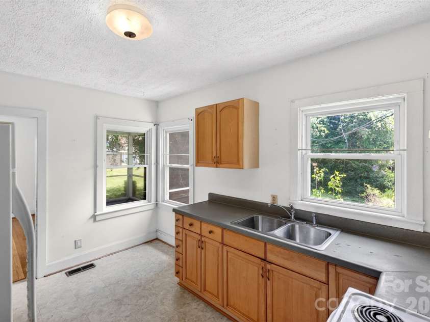 64 Second Street, Tryon, NC 28782.  MLS# CAR4395265, YatesRealty ID 38214. 