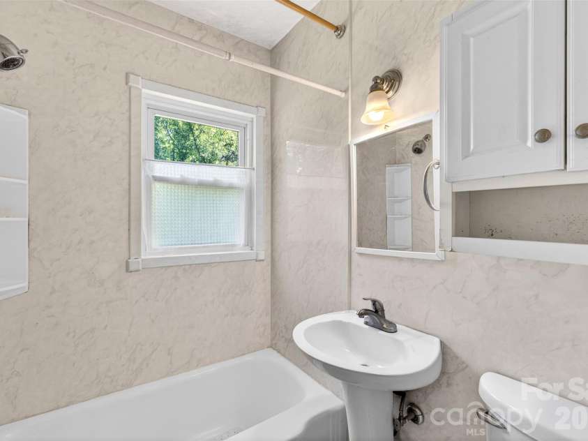 64 Second Street, Tryon, NC 28782.  MLS# CAR4395265, YatesRealty ID 38214. 