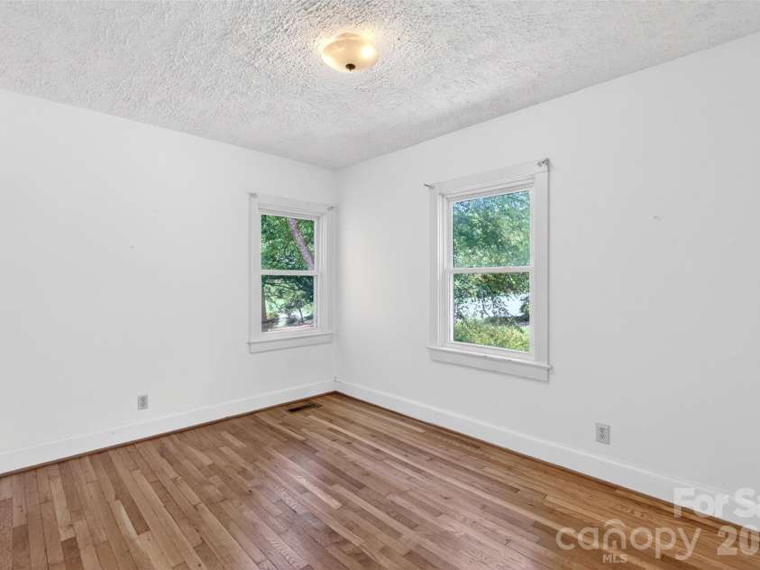 64 Second Street, Tryon, NC 28782.  MLS# CAR4395265, YatesRealty ID 38214. 