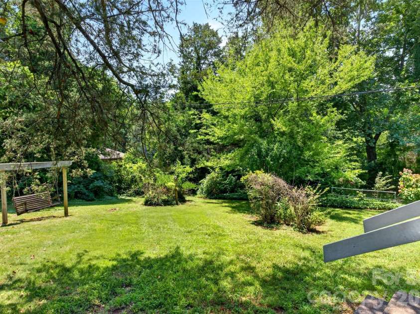 64 Second Street, Tryon, NC 28782.  MLS# CAR4395265, YatesRealty ID 38214. 