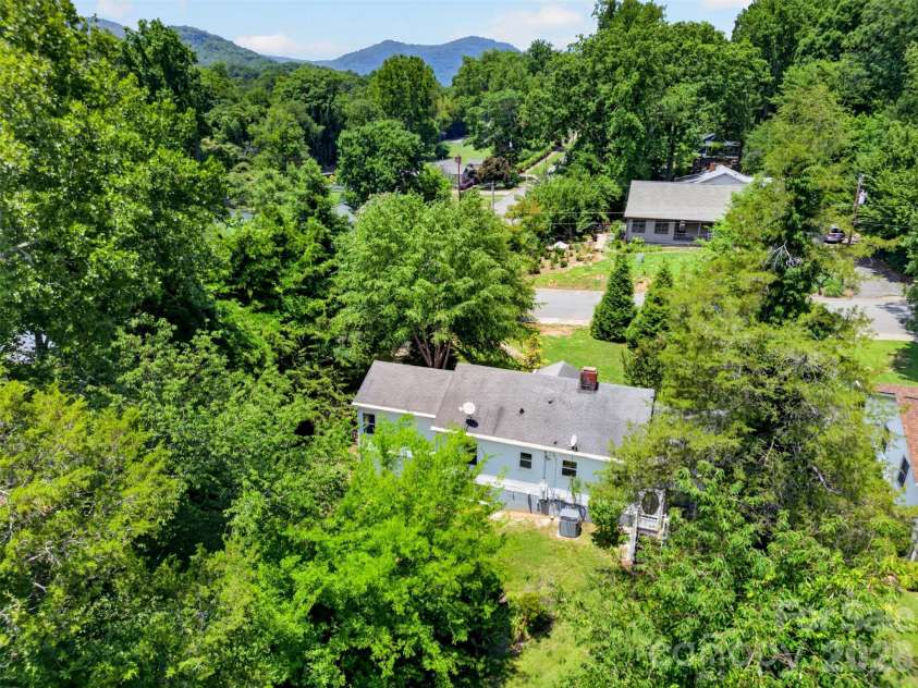 64 Second Street, Tryon, NC 28782.  MLS# CAR4395265, YatesRealty ID 38214. 