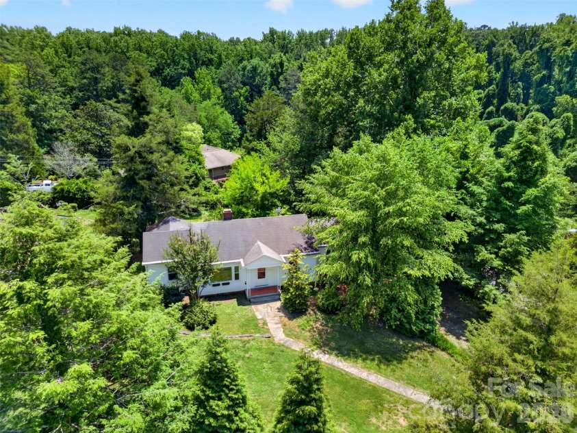 64 Second Street, Tryon, NC 28782.  MLS# CAR4395265, YatesRealty ID 38214. 