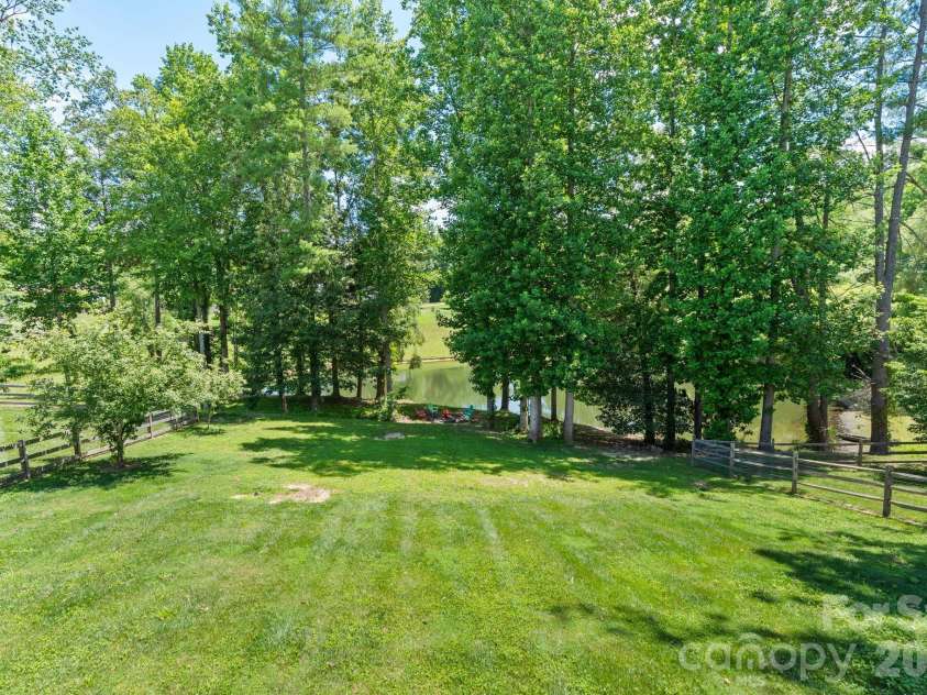 36 Copper Mill Court, Candler, NC 28715.  MLS# CAR4396335, YatesRealty ID 38225. Big Backyard