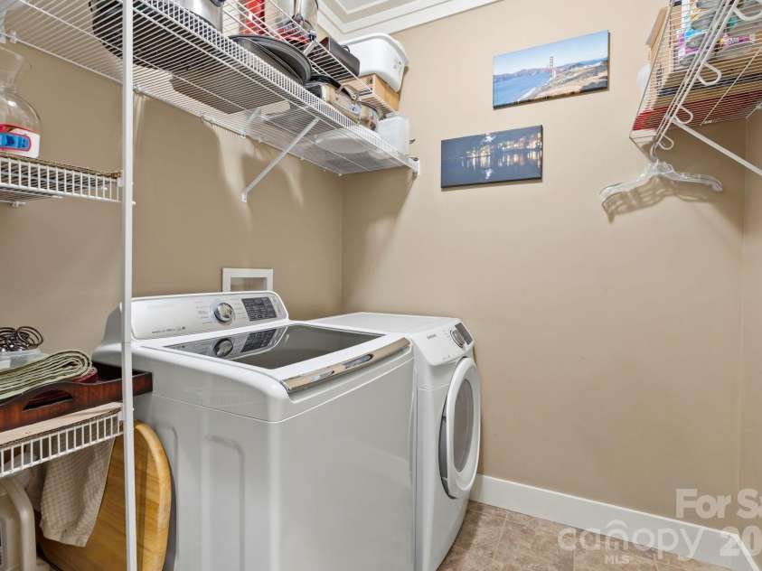 36 Copper Mill Court, Candler, NC 28715.  MLS# CAR4396335, YatesRealty ID 38225. Laundry Room
