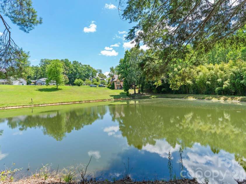 36 Copper Mill Court, Candler, NC 28715.  MLS# CAR4396335, YatesRealty ID 38225. Lower Pond