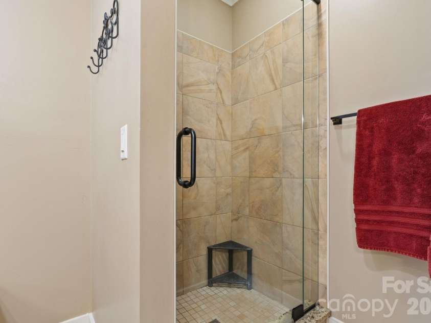 36 Copper Mill Court, Candler, NC 28715.  MLS# CAR4396335, YatesRealty ID 38225. Primary Shower