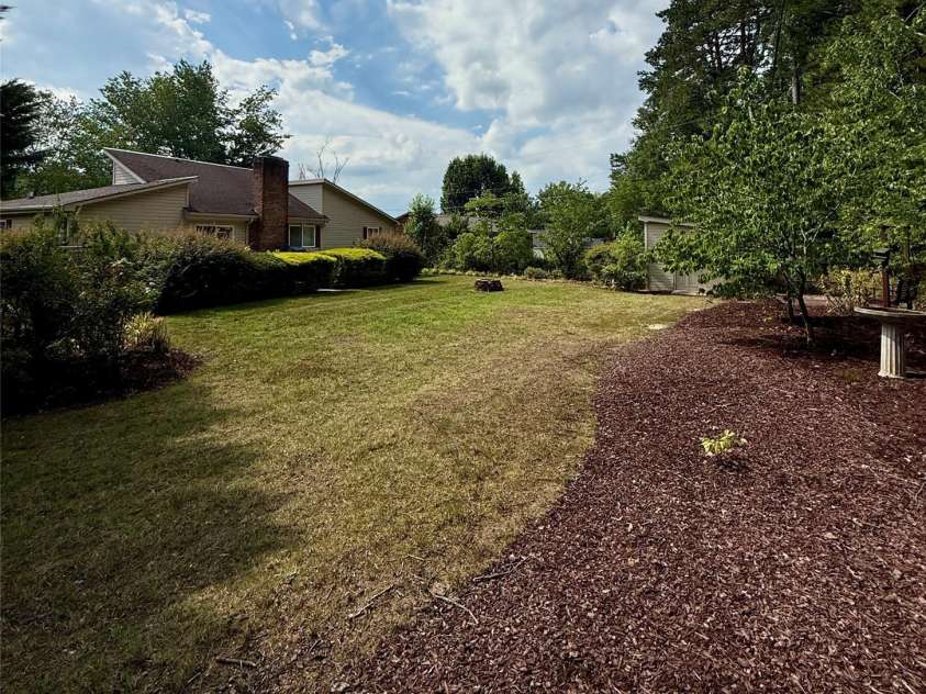 1100 Jennifer Lane, Cherryville, NC 28021.  MLS# CAR4400646, YatesRealty ID 38227. Back Yard