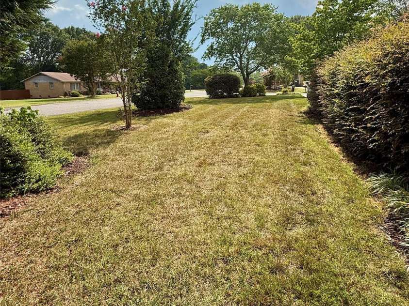 1100 Jennifer Lane, Cherryville, NC 28021.  MLS# CAR4400646, YatesRealty ID 38227. Side Yard