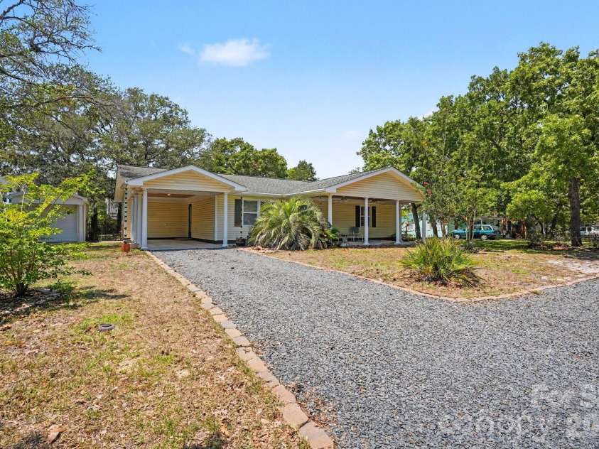 121 1st Street, Oak Island, NC 28465.  MLS# CAR4404040, YatesRealty ID 38229. 
