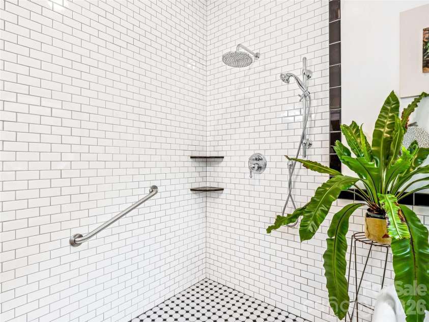 138 French Broad Avenue, Asheville, NC 28801.  MLS# CAR4301394, YatesRealty ID 3823. Tiled shower