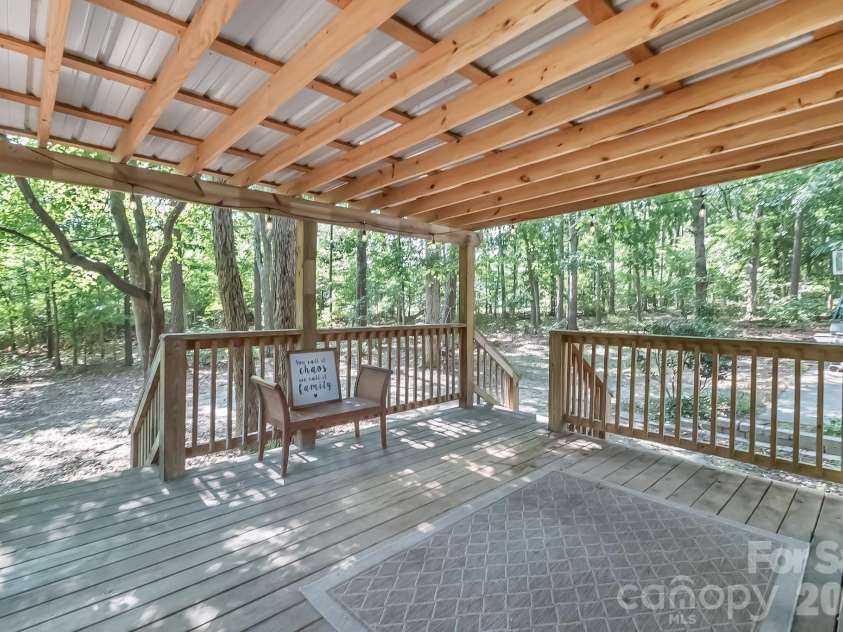 3623 Wonderland Drive, Matthews, NC 28104.  MLS# CAR4399769, YatesRealty ID 38231. Covered back deck