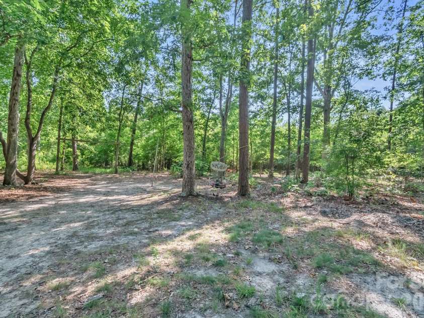 3623 Wonderland Drive, Matthews, NC 28104.  MLS# CAR4399769, YatesRealty ID 38231. Shaded & private back yard