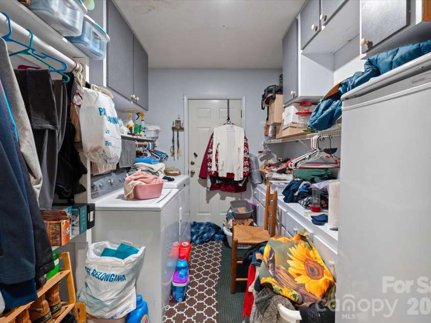 530 West Side Road, Burnsville, NC 28714.  MLS# CAR4403042, YatesRealty ID 38233. Huge laundry room on main level with ample storage
